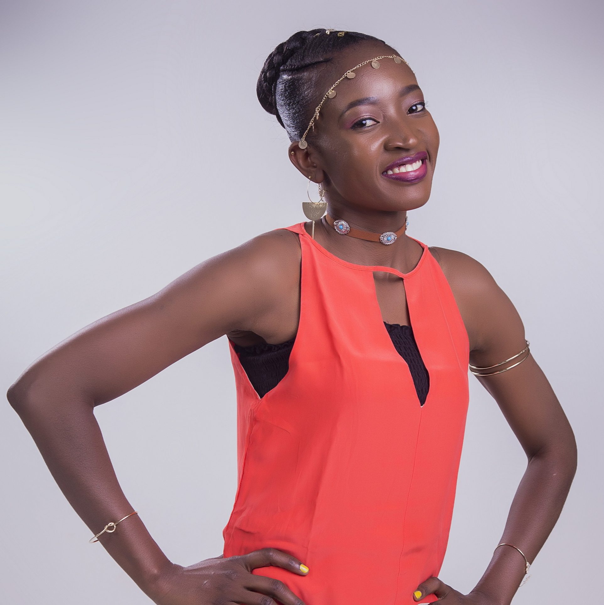 A Woman With Her Hands On Her Hips